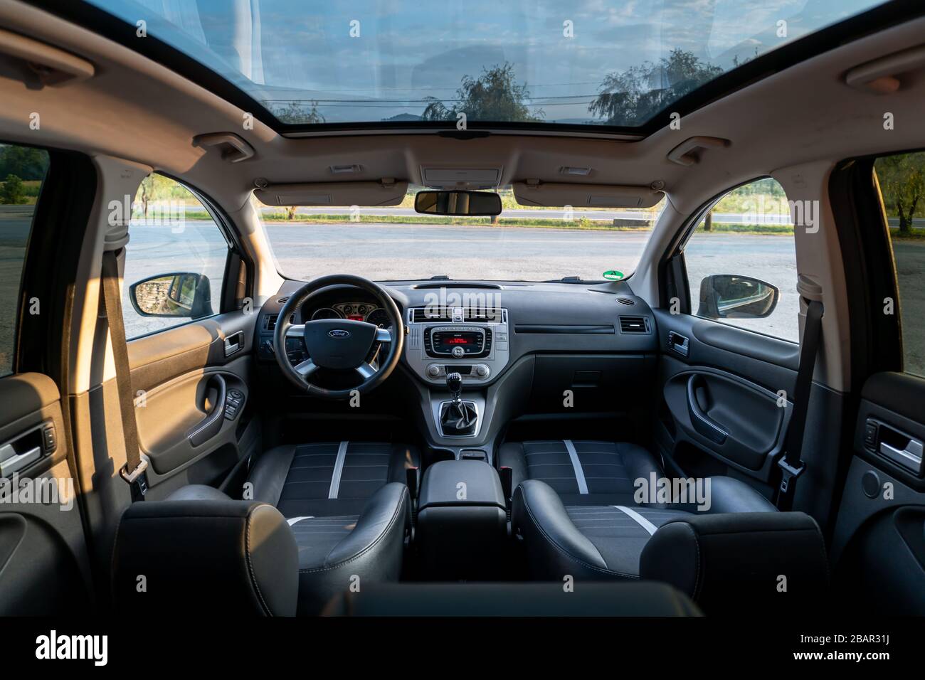 Inside detailed photo of wonderful SUV with panoramic glazed dach/sunroof Stock Photo