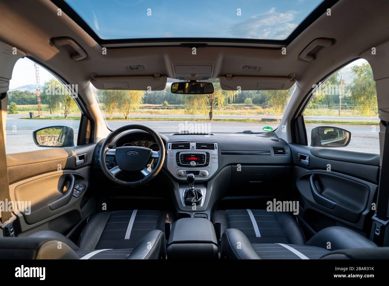 Inside detailed photo of wonderful SUV with panoramic glazed dach/sunroof Stock Photo