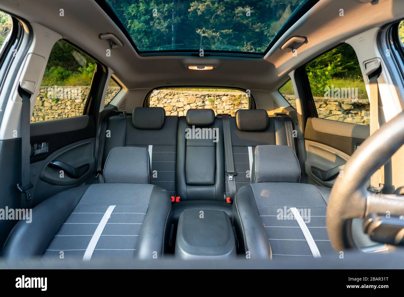 Inside detailed photo of wonderful SUV with panoramic glazed dach/sunroof Stock Photo