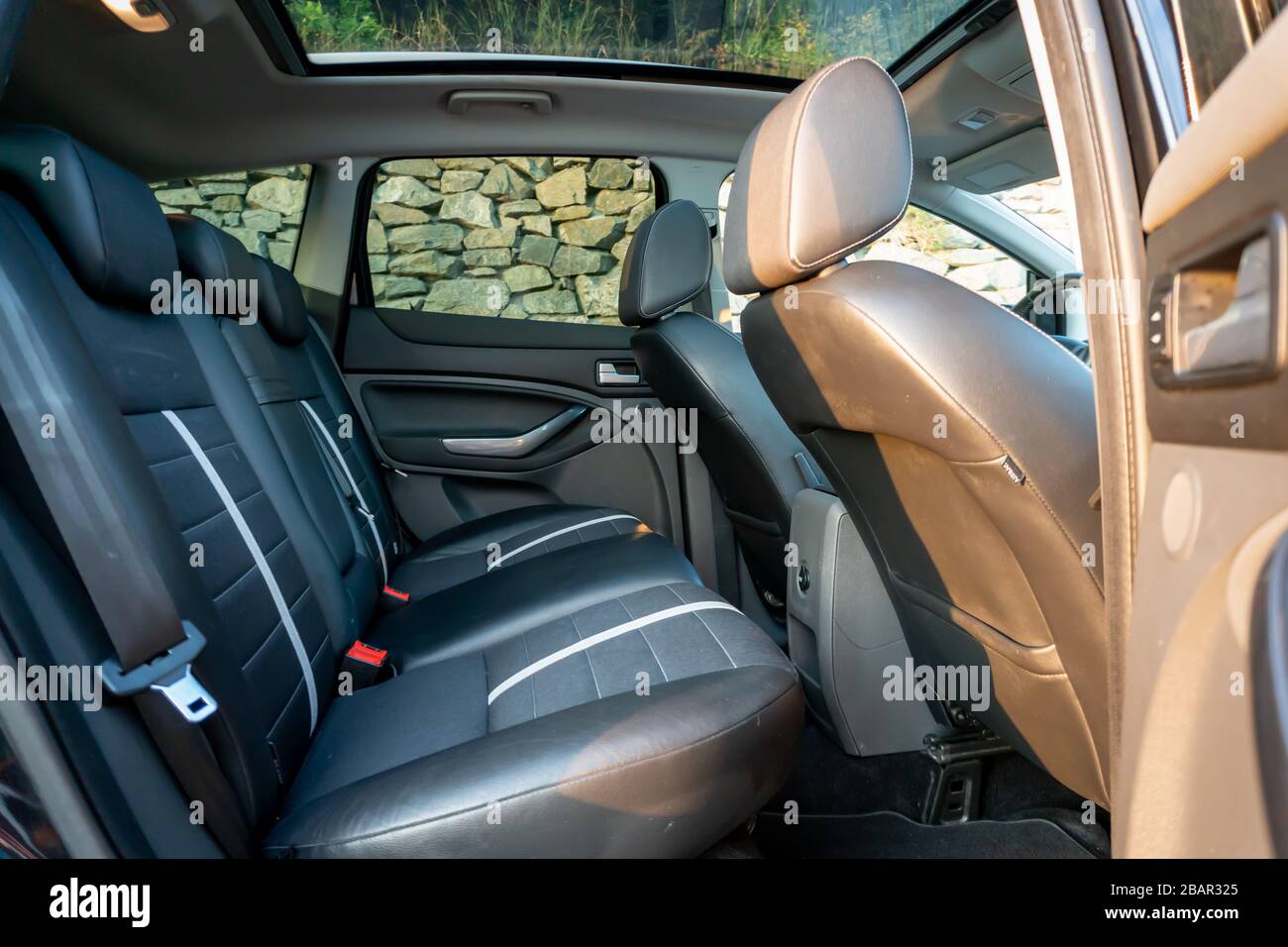 Inside detailed photo of wonderful SUV with panoramic glazed dach/sunroof Stock Photo