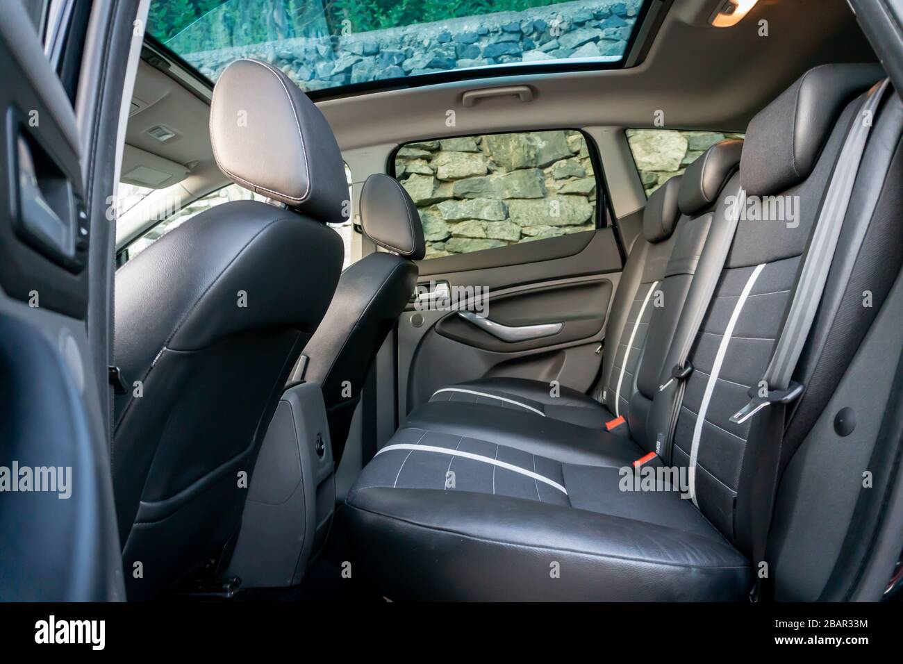 Inside detailed photo of wonderful SUV with panoramic glazed dach/sunroof Stock Photo