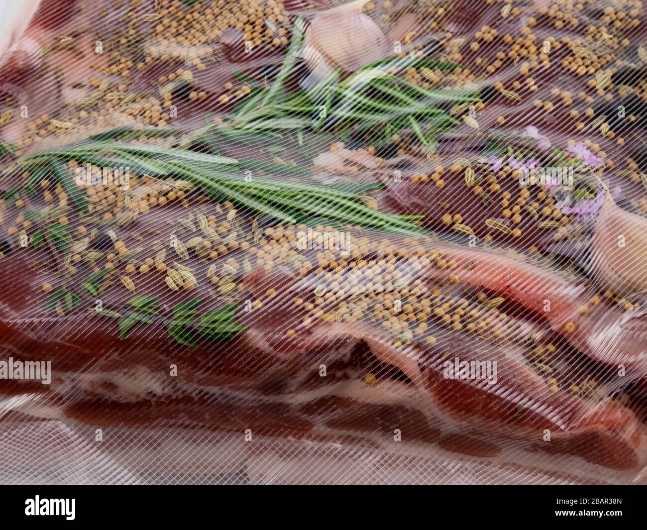 spiced pork belly prepared for sous vide low temperature cooking