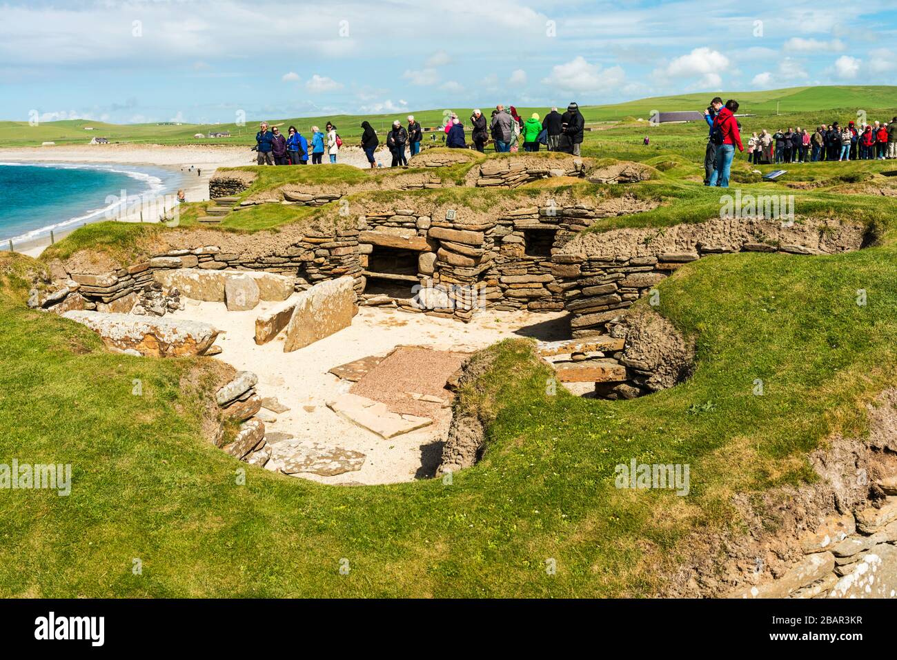 Skara Brae is a Neolithic settlement on the Bay of Skaill, Orkney, Scotland.  It was occupied between 3180 BC and 2500 BC. Stock Photo