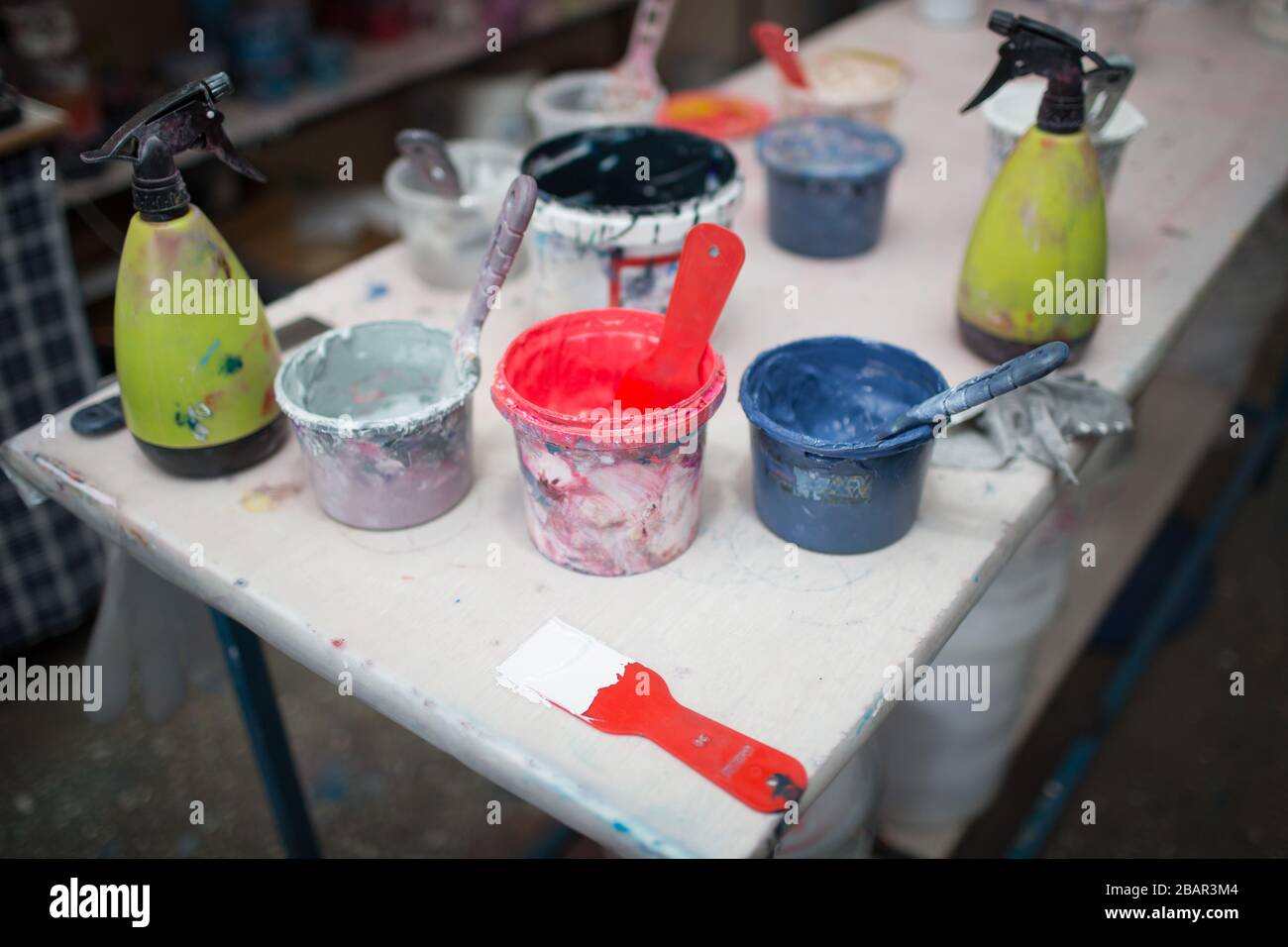 Silk screen printing. Serigraphy. Color paints and fabric. Plastisol