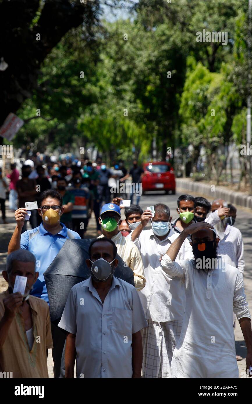 Dhaka Power Distribution Company(DPDC) subscribers in a long queue to