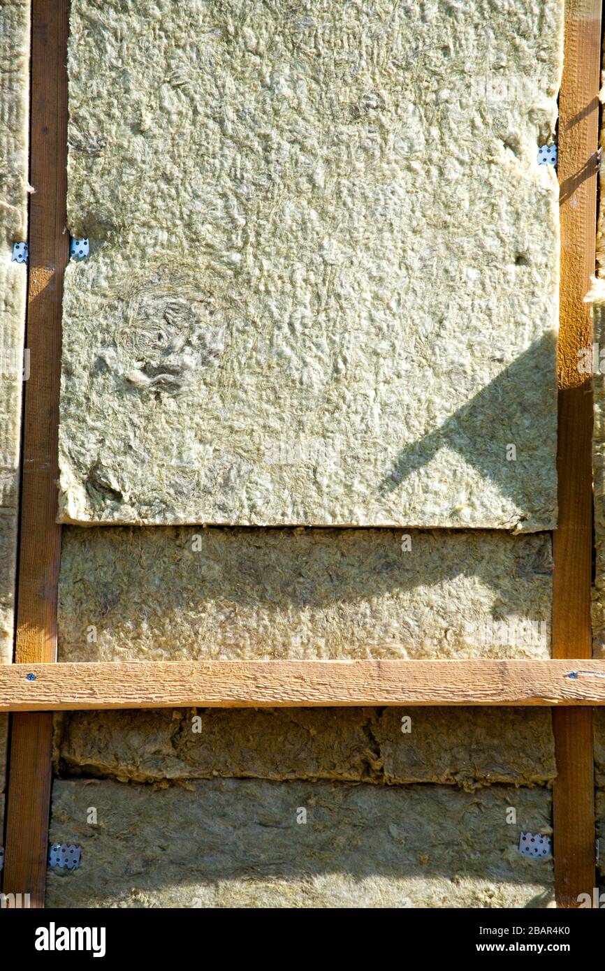 warming the walls of a stone house with a stone wool heater. Ecological