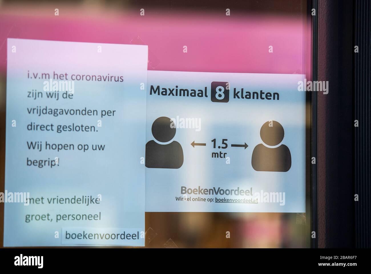 Coronavirus sign explaining rules on social distancing in the window of ...
