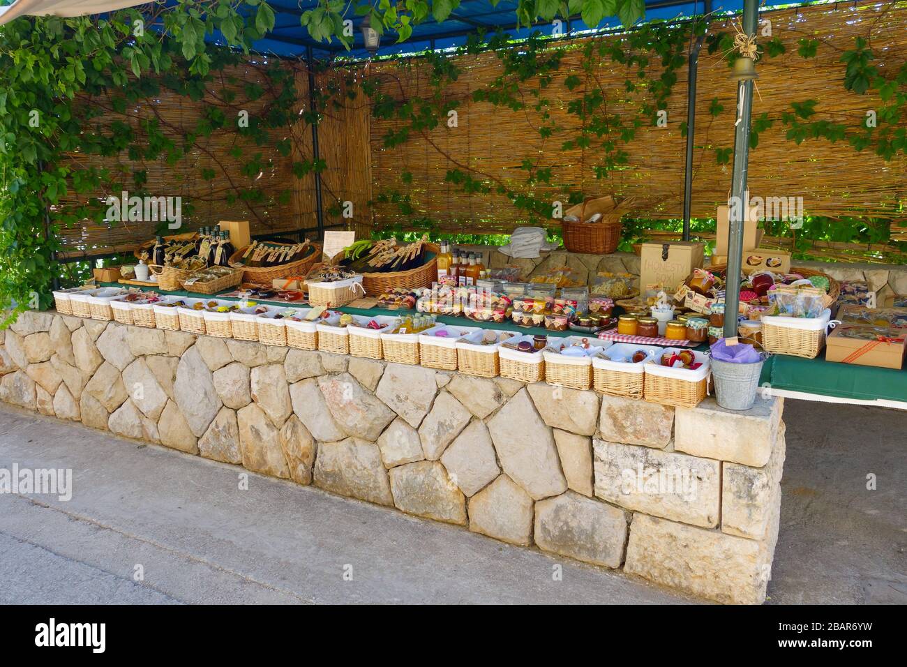 Home made food and drink for sale on a stall on the island of Koločep, Croatia Stock Photo