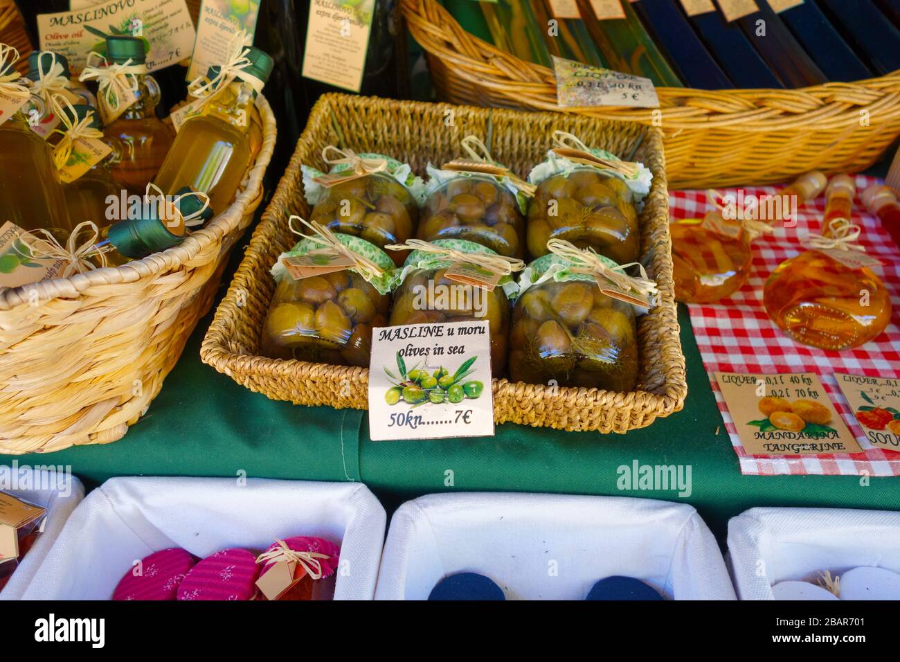 Home made food and drink for sale on a stall on the island of Koločep, Croatia Stock Photo