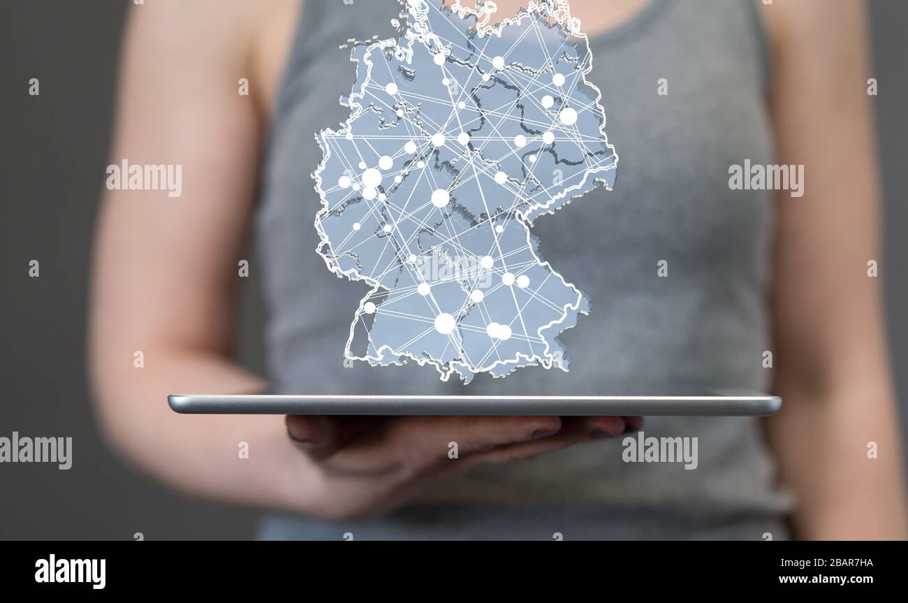 A germany map digital in hand 3d Stock Photo - Alamy