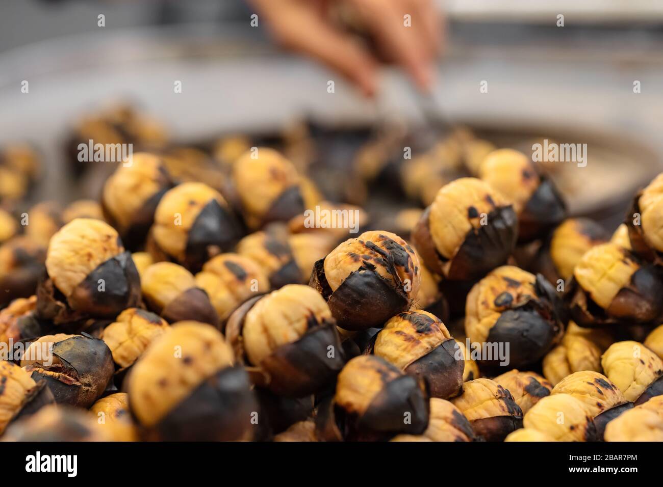 Closeup of street food of roasted chestnuts in Turkey Stock Photo