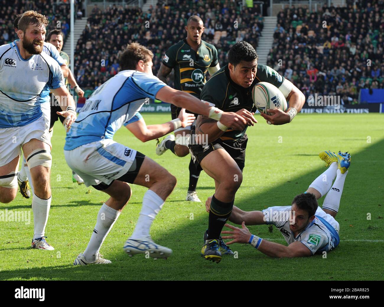 Northampton Saints' George Pisi on his way to scoring their first try ...
