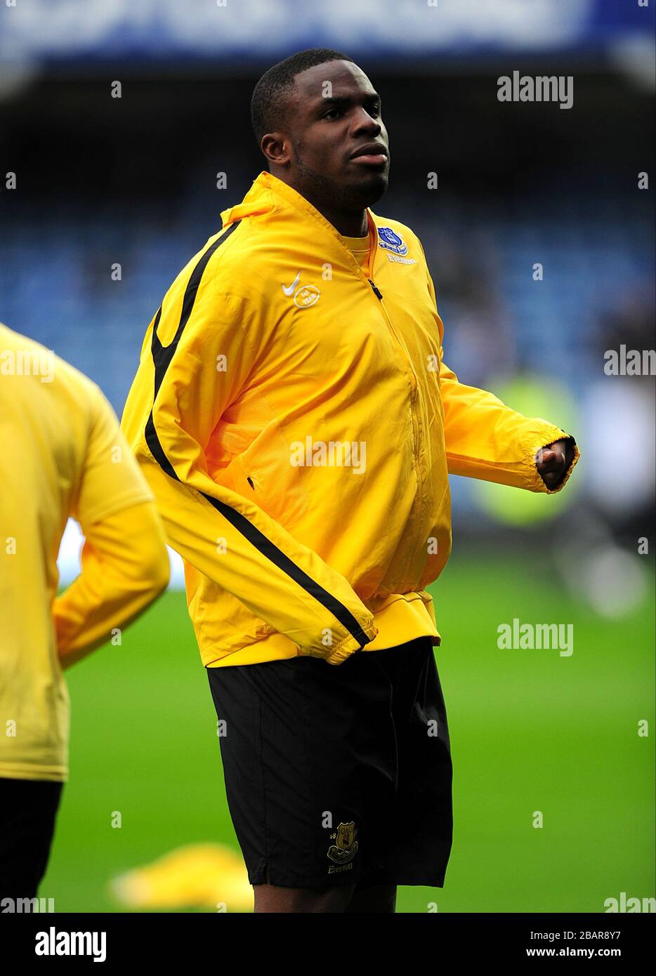 Everton's Victor Anichebe opts no to wear an anti-rascism t-shirt during pre-match training Stock Photo
