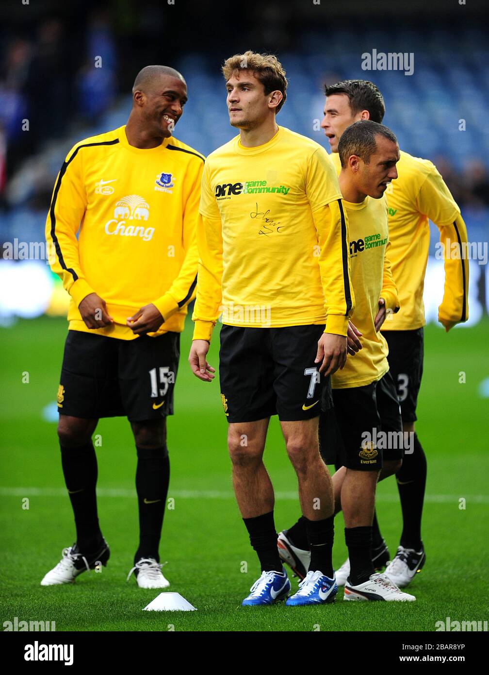 Everton's Sylvain Distin (left) opts no to wear an anti-rascism t-shirt during pre-match training Stock Photo