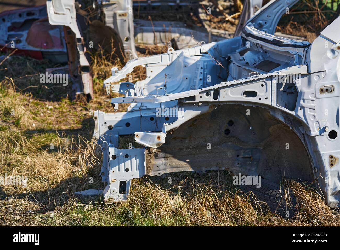 Old Gray Car Frame Disassembled Car With Rusty Parts On The Street Near 