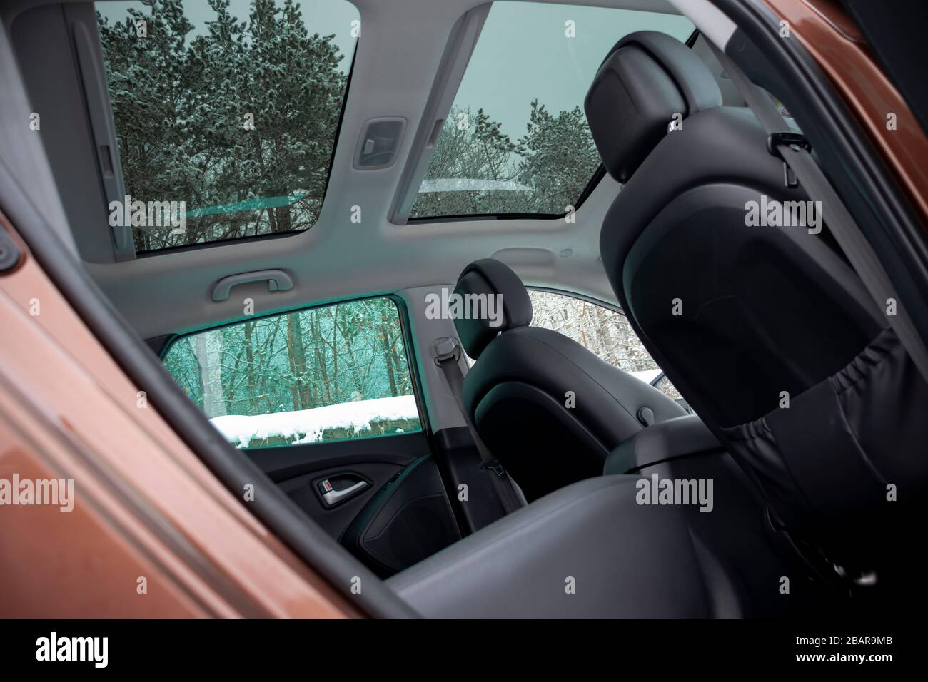 Panoramic view inside car double sunroof hatch with tinted glass