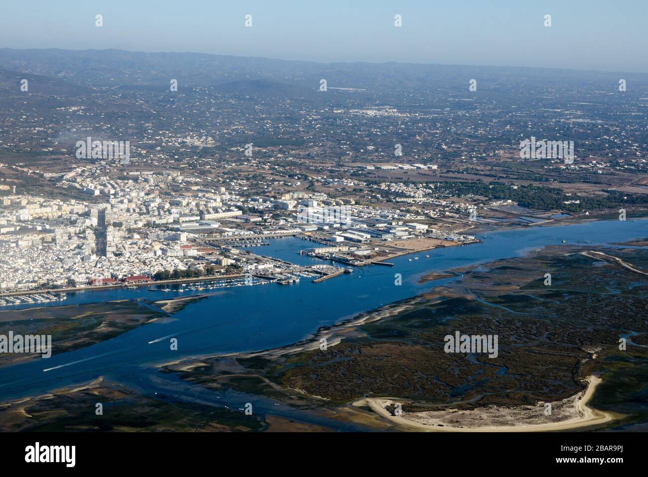 Aerial view of Olhao harbour and district fishing port on the Algarve coast of southern Portugal. Stock Photo