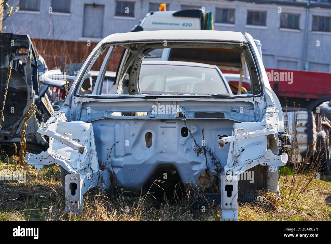 Old Gray Car Frame Disassembled Car With Rusty Parts On The Street Near 