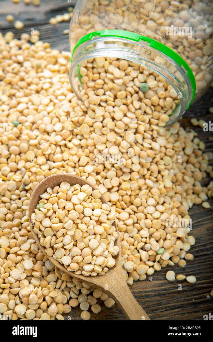 Yellow split peas used to make soup and pease pudding. Dried foods. Stock Photo