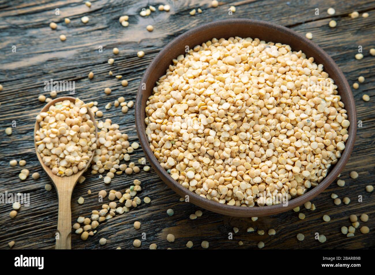 Yellow split peas used to make soup and pease pudding. Dried foods. Stock Photo