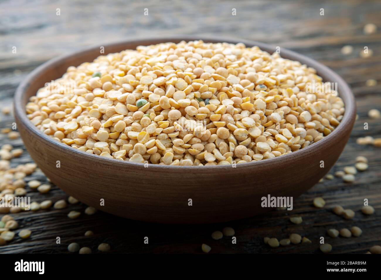 Yellow split peas used to make soup and pease pudding. Dried foods. Stock Photo