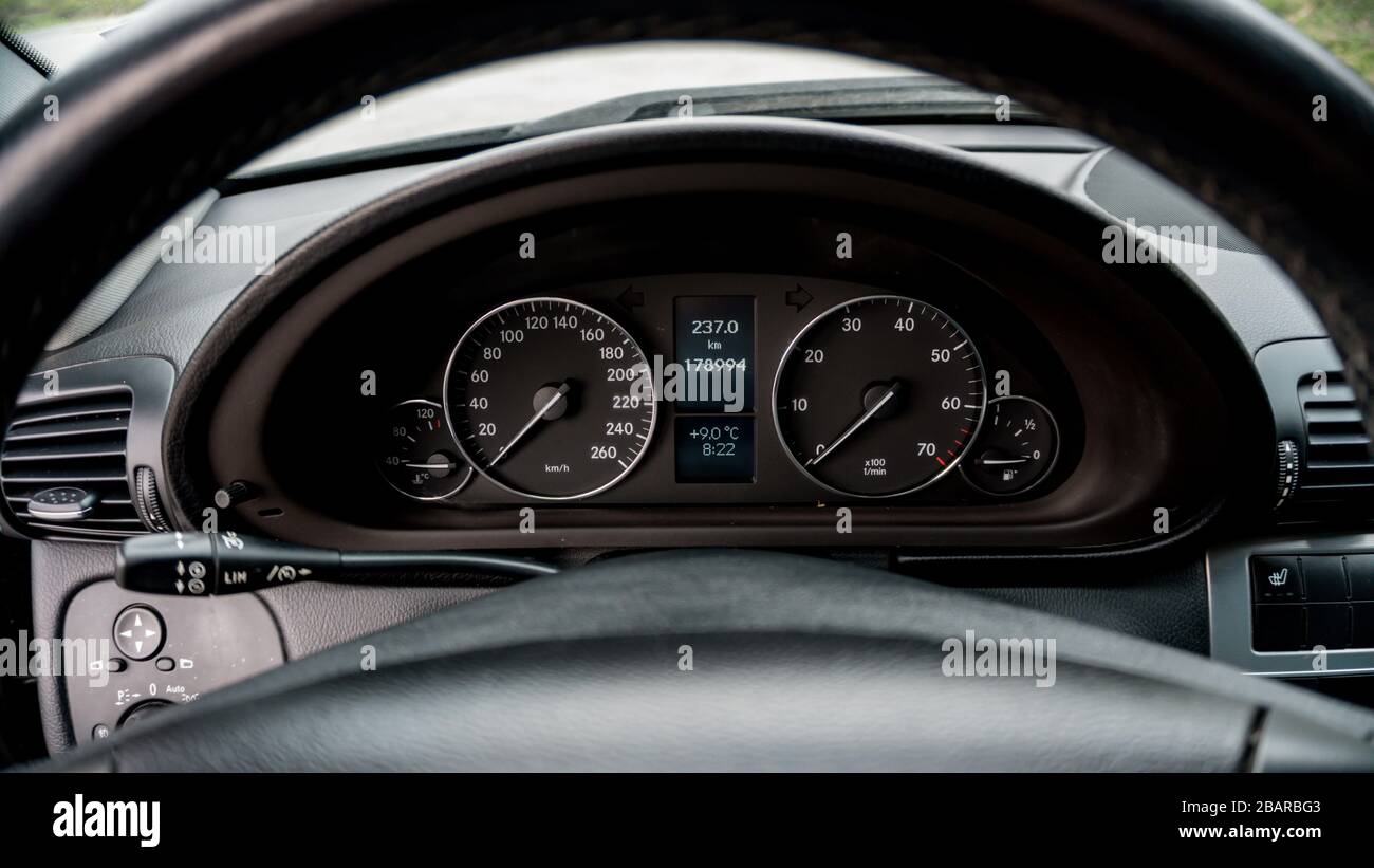 Car instrument cluster, speedometer, engine temperature, trip computer, gauges, odometer, dashboard Stock Photo
