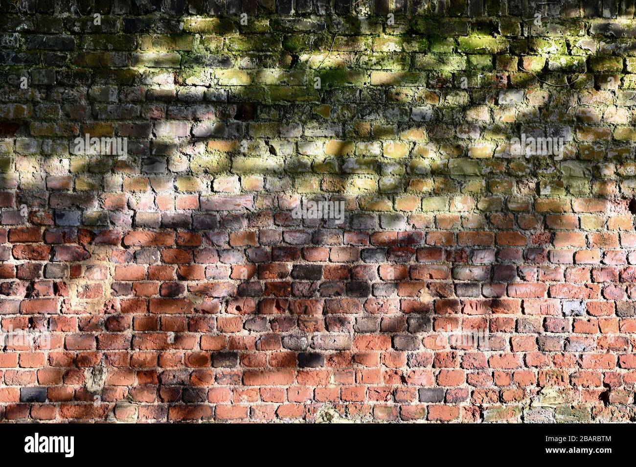 Old Brick Wall, Parish Church of St James, North Cray, Kent. UK Stock Photo