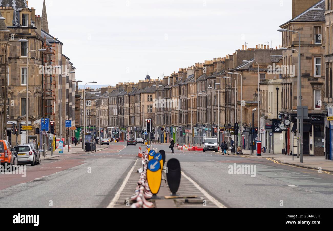 Edinburgh, Scotland, UK. 29 March, 2020. Life in Edinburgh on the first Sunday of the Coronavirus lockdown. Streets deserted, shops and restaurants closed, very little traffic on streets and reduced public transport. Pictured; Leith Walk is empty. Iain Masterton/Alamy Live News Stock Photo