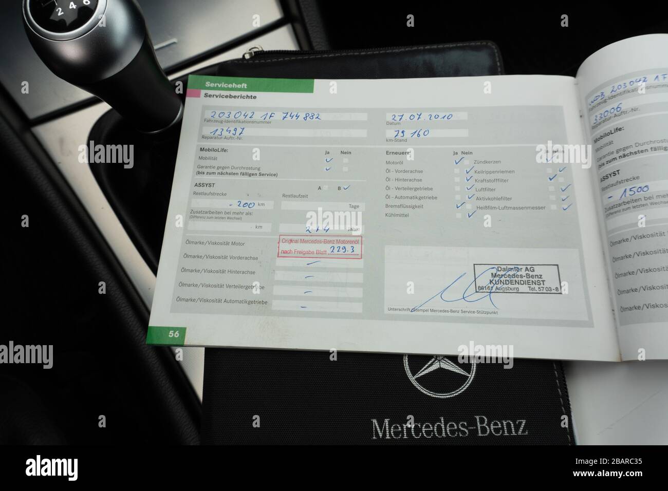 Mercedes Benz service history book-scheduled maintenance, check engine  faults, repair and maintenance records Stock Photo - Alamy