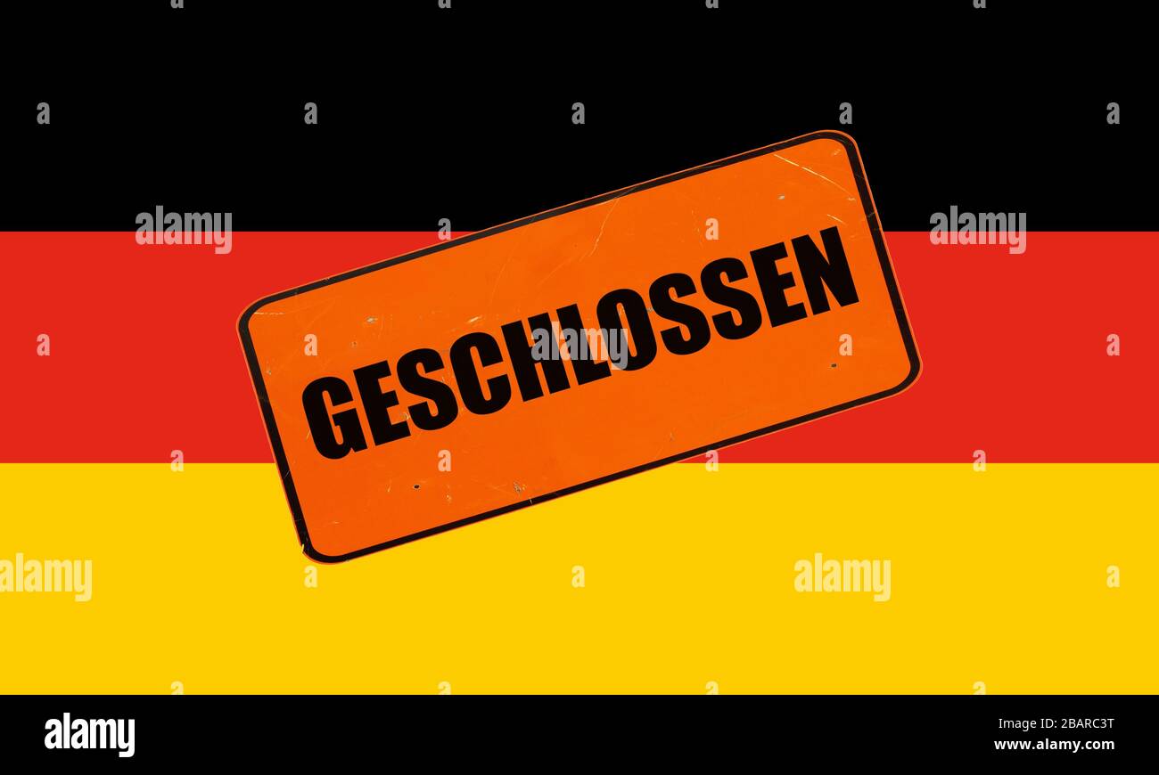 the German national flag of Germany, Europe with geschlossen (translation: closed) sign Stock Photo
