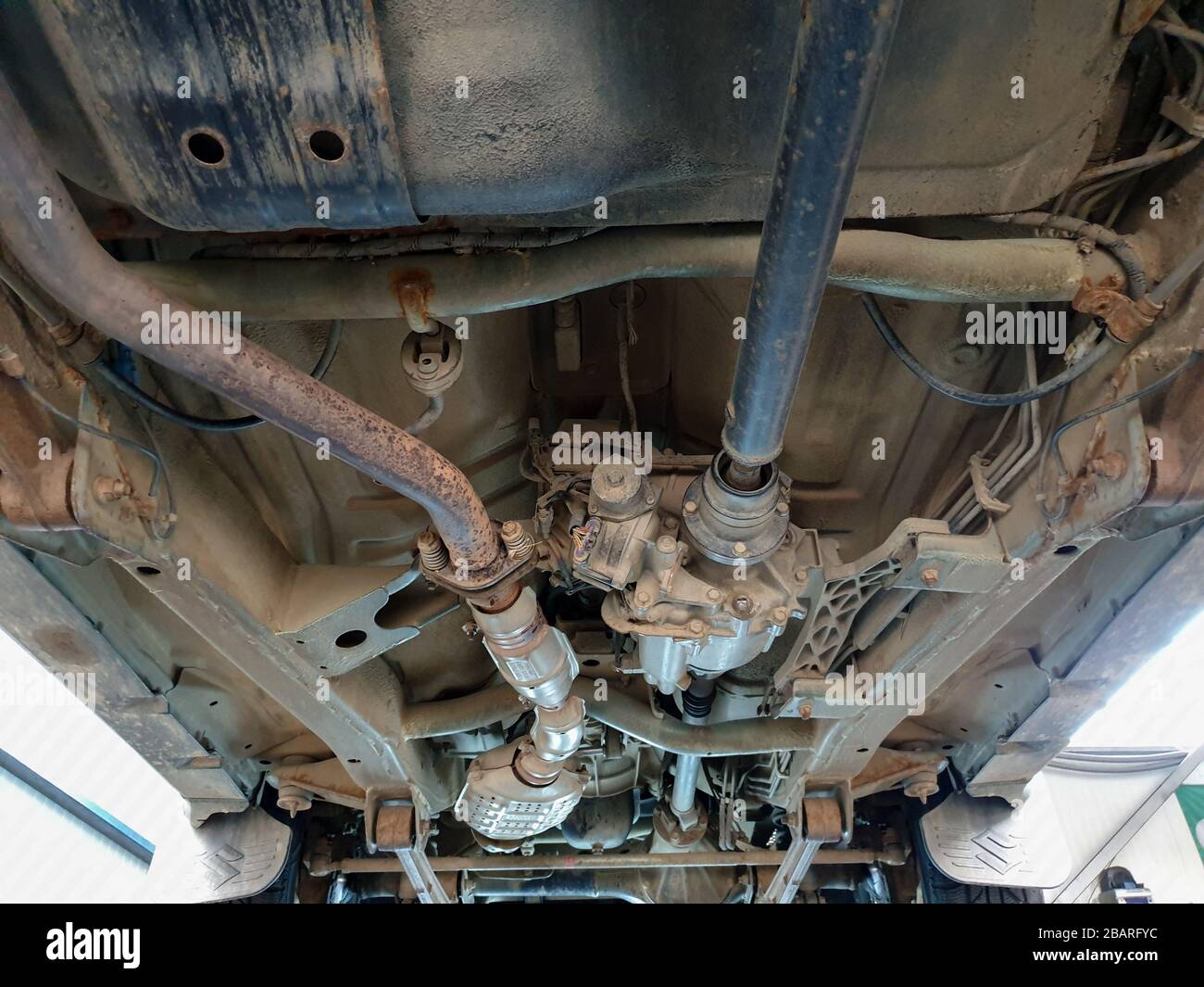 Underneath A Small Suv 4wd Technology Gear Transmission Catalizator Exhaust Pipe Rusty Parts 2wd Stock Photo Alamy