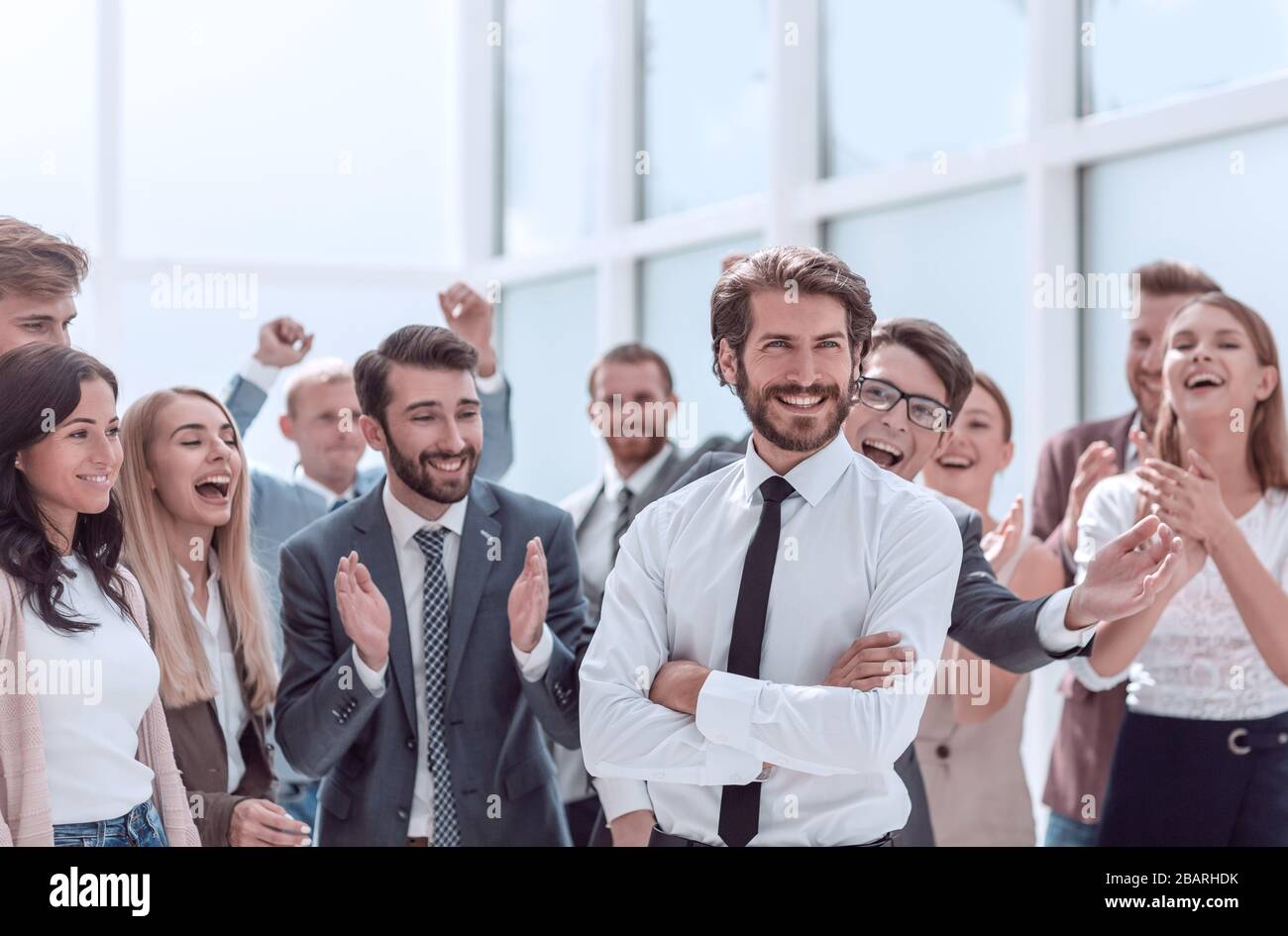 young entrepreneur and happy business team standing together Stock ...