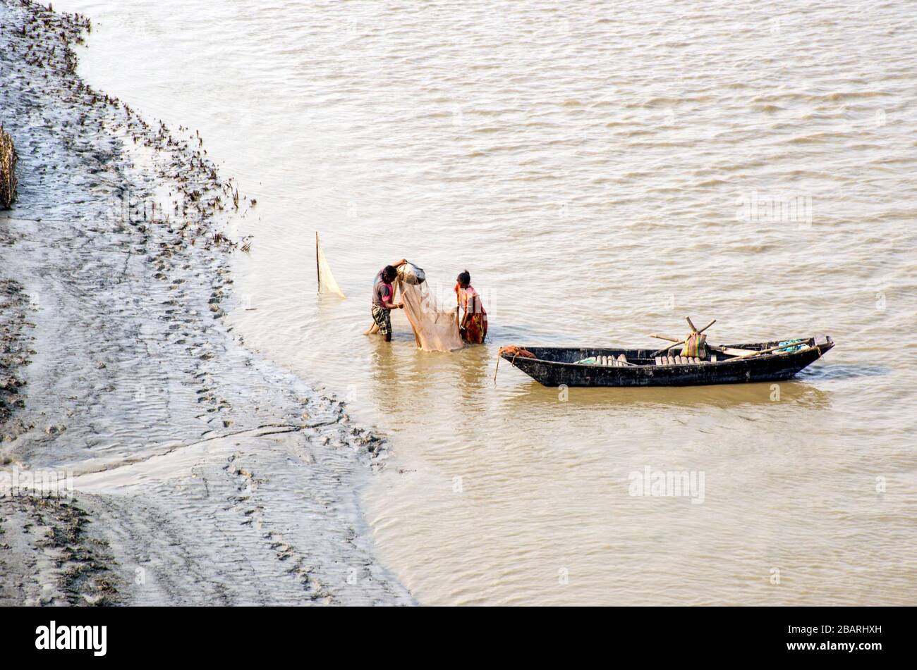 tug of war at matla river west bengal india Stock Photo
