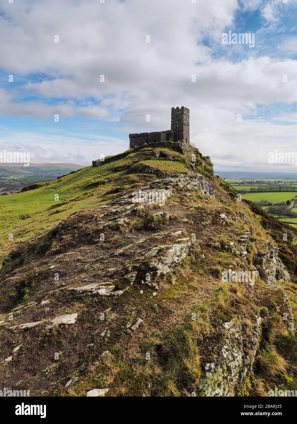 13th century church of St Michael de Rupe on top of Brent Tor, an old weathered volcano, Dartmoor National Park, Devon Stock Photo