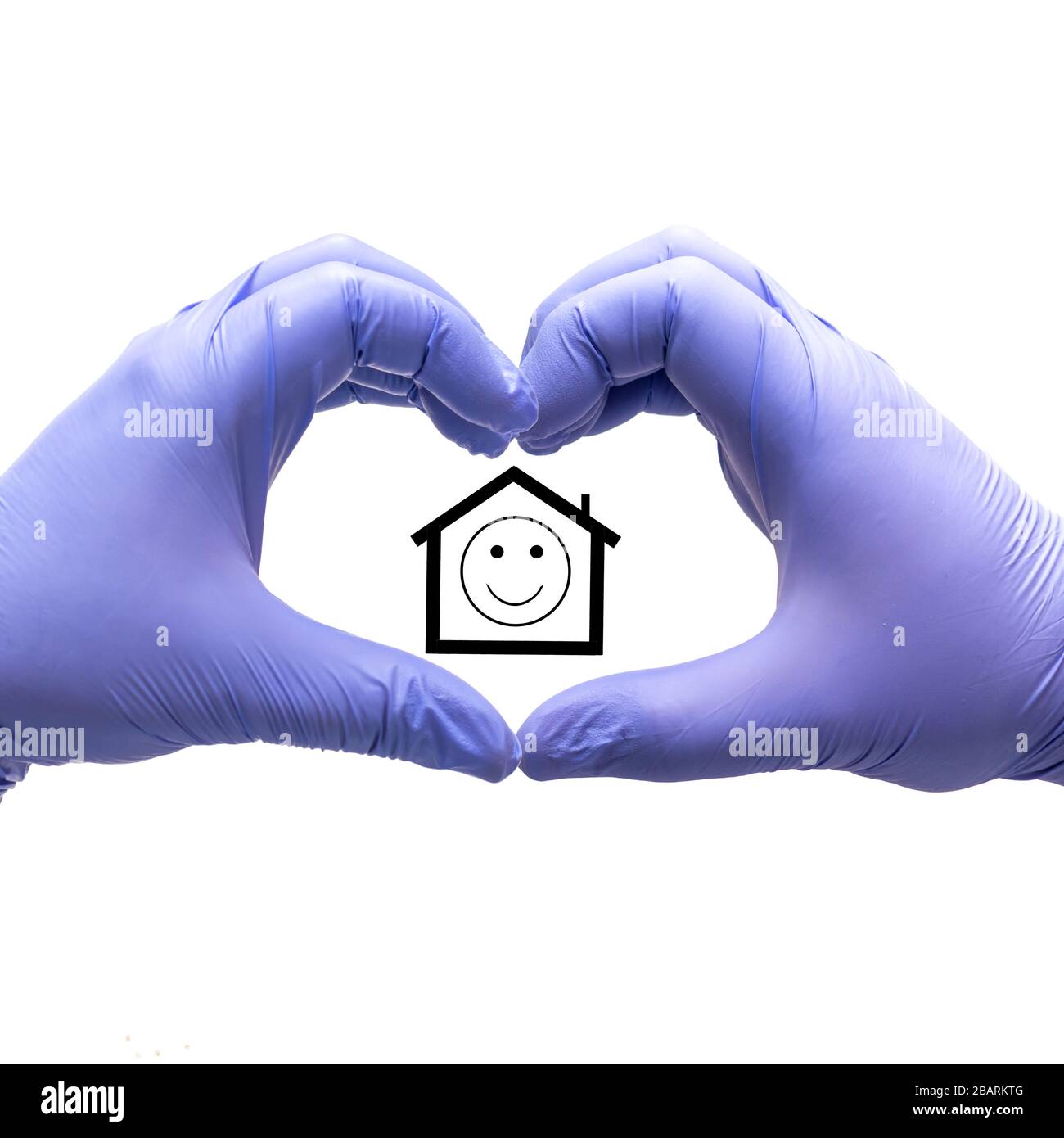 Love signs from hand with medical gloves. Stay home  fighting the coronavirus pandemic. Stock Photo