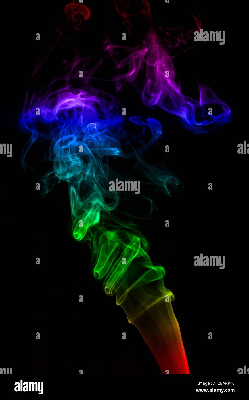 Abstract color smoke on black background Stock Photo - Alamy