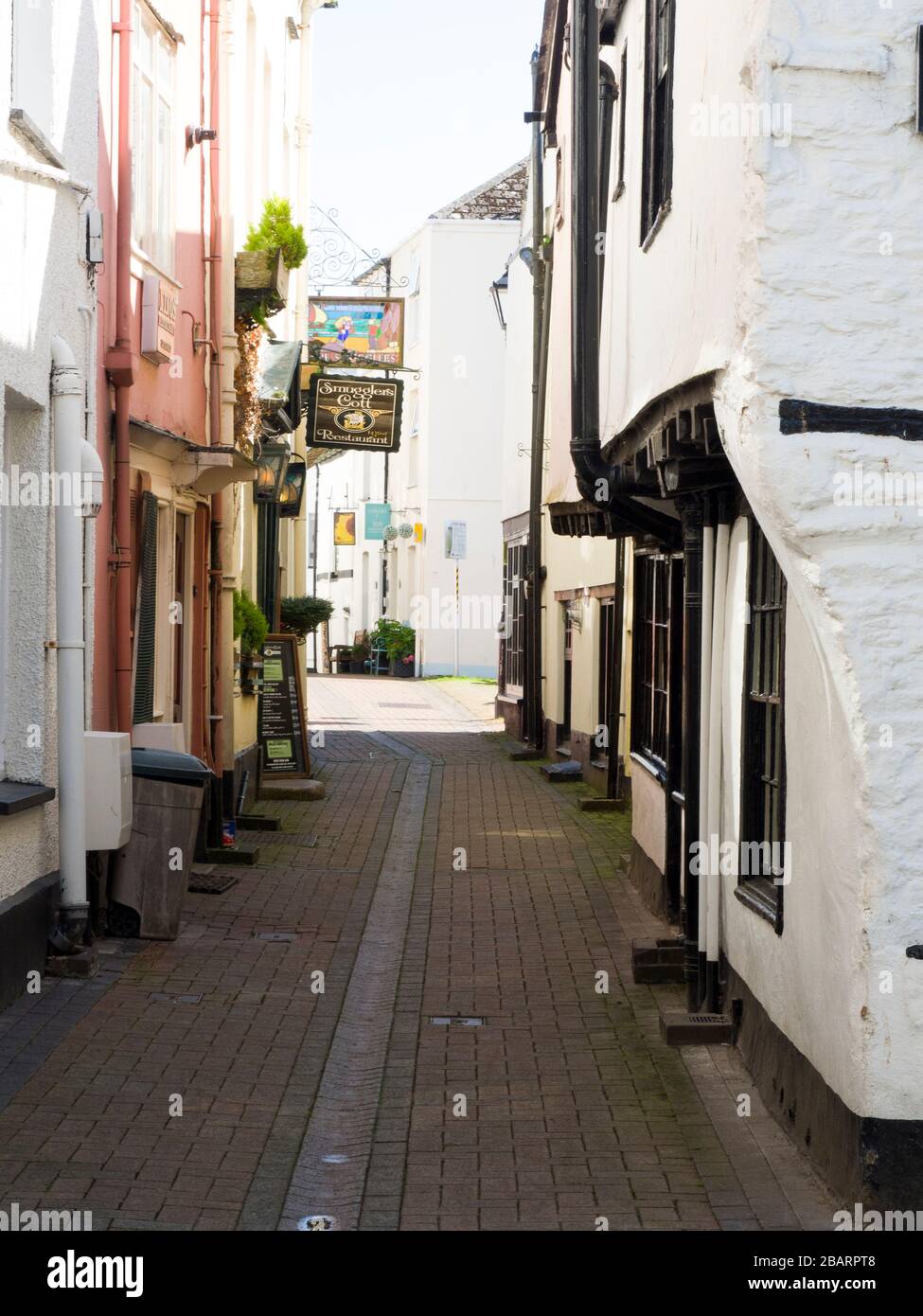 Narrow Cornish town street, Looe, Cornwall, UK Stock Photo