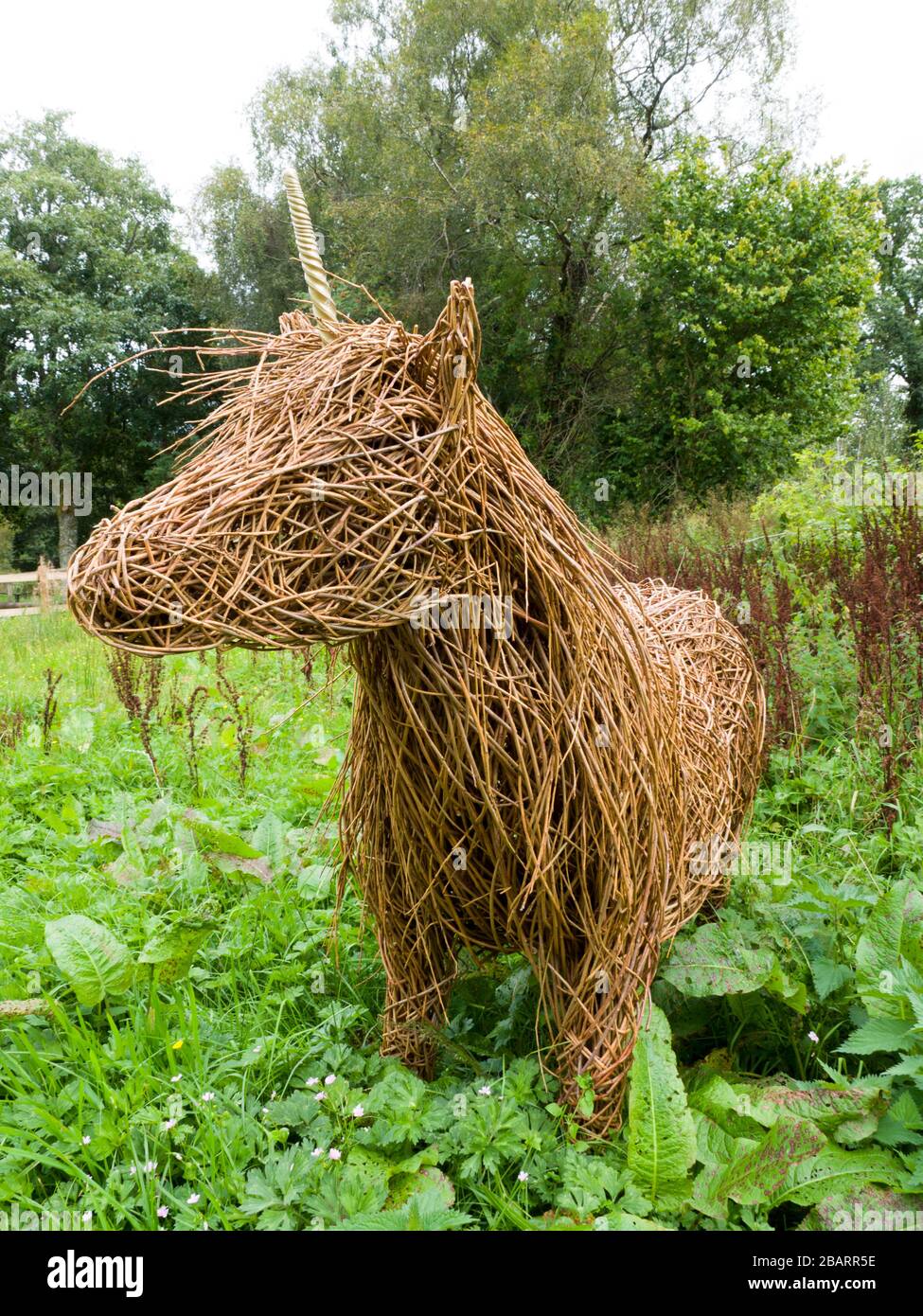 Unicorn statue made of natural products, The Miniature Pony Centre, Dartmoor, Devon, UK Stock Photo