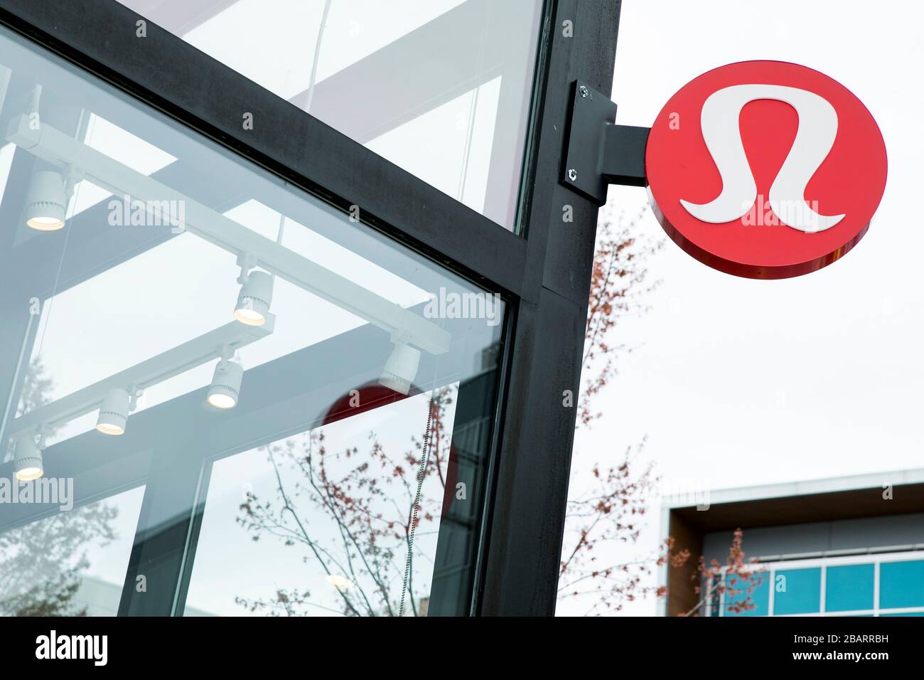 https://c8.alamy.com/comp/2BARRBH/a-logo-sign-outside-of-a-lululemon-athletica-retail-store-location-in-fairfax-virginia-on-march-22-2020-2BARRBH.jpg