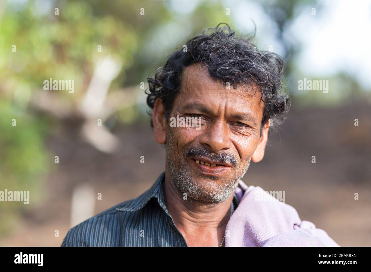 Local man chewing betel nut - a mild stimulant - at Ella in the Hill Country of Sri Lanka Stock Photo