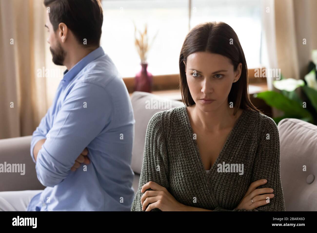 Stressed depressed couple ignoring each other after quarrel. Stock Photo