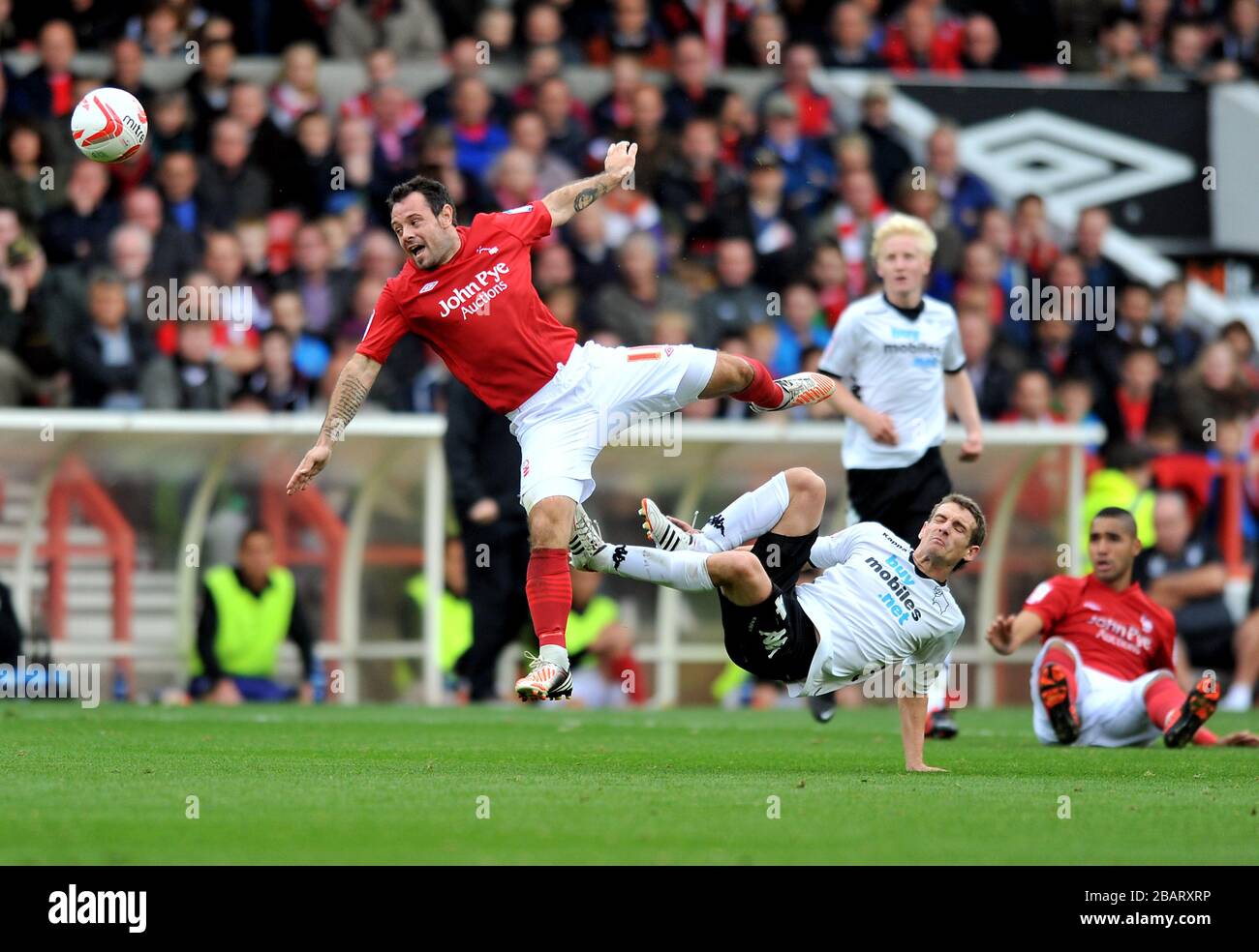 Nottingham Forest's Andy Reid is sent flying Stock Photo