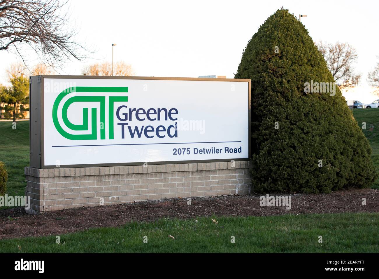 A logo sign outside of the headquarters of Greene, Tweed & Co., Inc., in Kulpsville, Pennsylvania, on March 23, 2020. Stock Photo