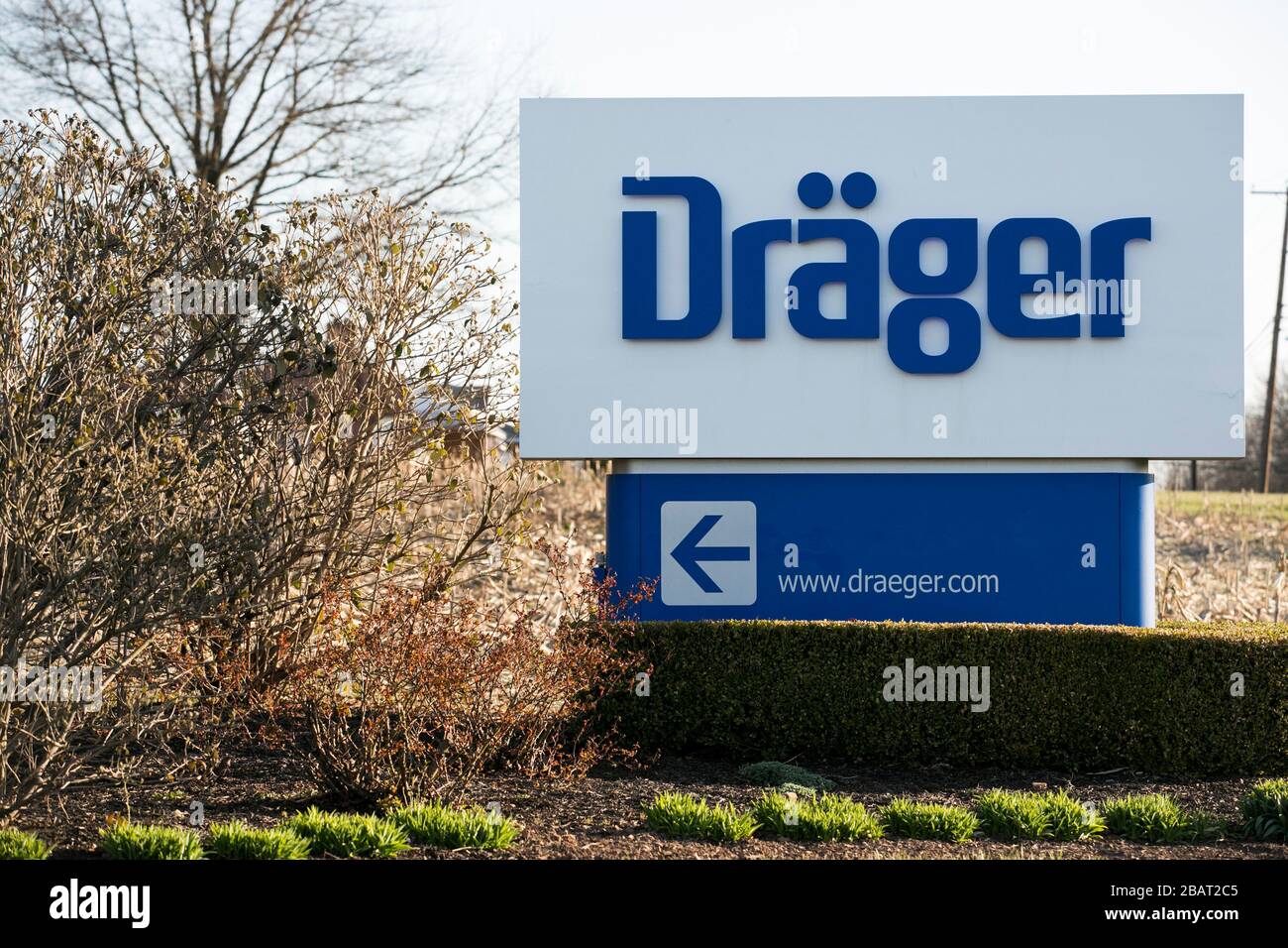 A logo sign outside of a facility occupied by Drägerwerk AG (Dräger) in