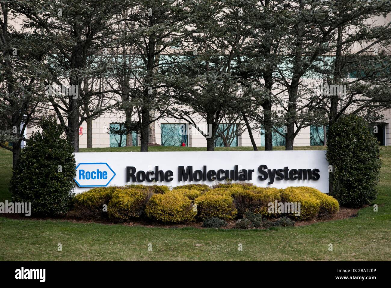 A logo sign outside of a facility occupied by Roche Molecular Systems in Branchburg, New Jersey, on March 23, 2020. Stock Photo