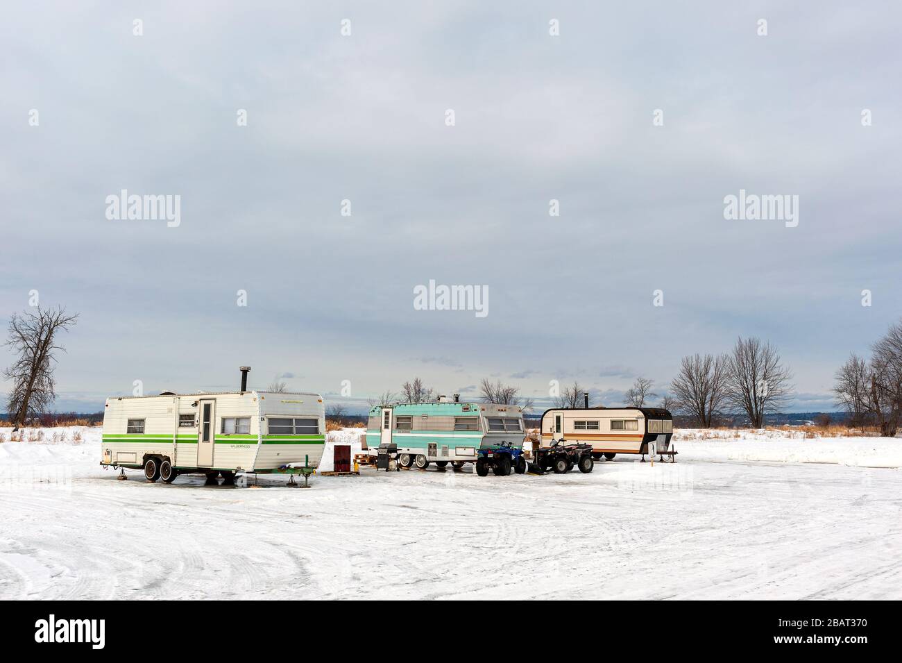 Winter camping on frozen lake Stock Photo