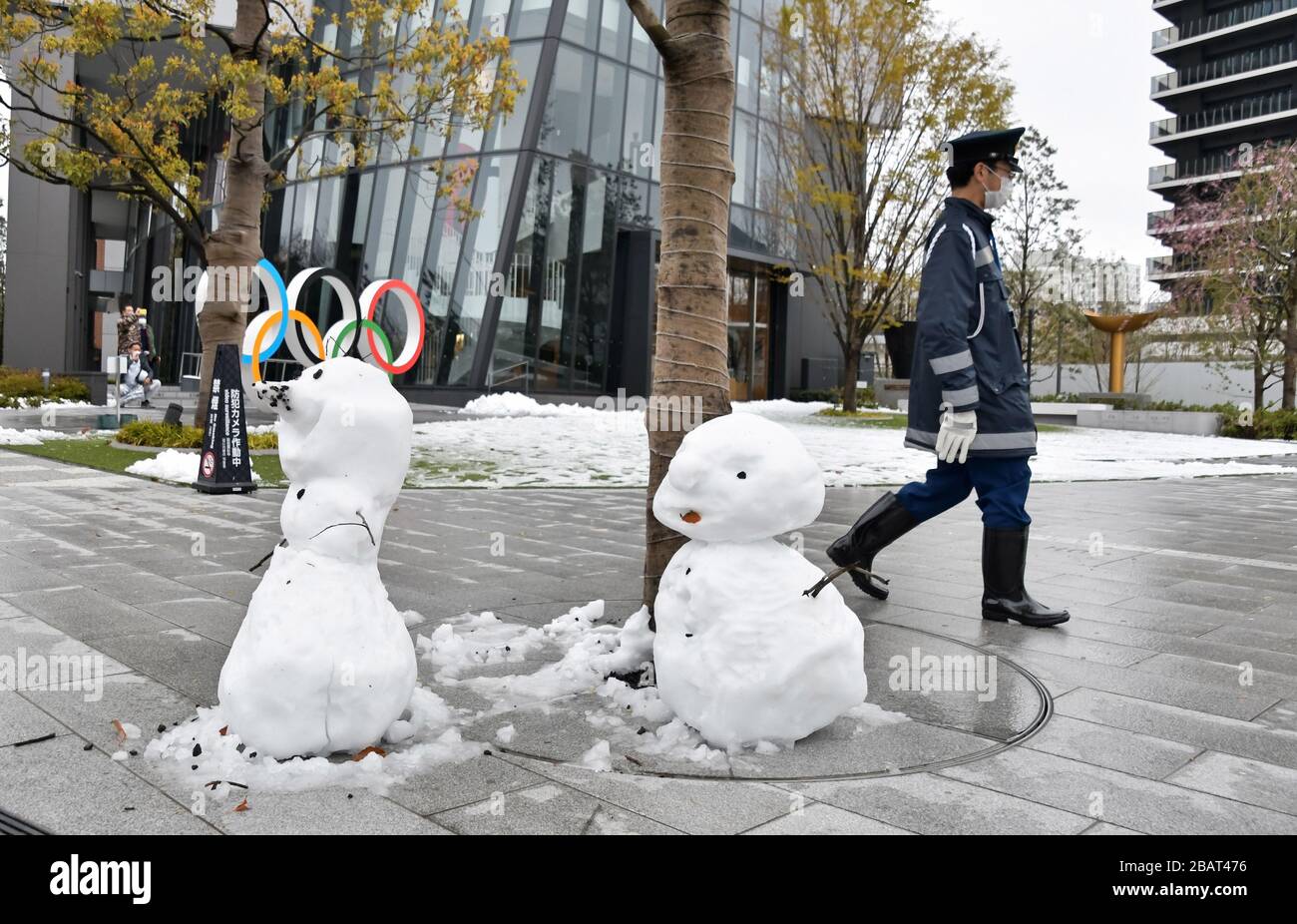 Tokyo, Japan. 29th Mar, 2020. Snowman are seen near the National Stadium in Tokyo, Japan on Sunday, March 29, 2020. It's first time in 32 years that Tokyo witnessed the accumulation of snow measuring 1 centimeter or more in late March. Photo by Keizo Mori/UPI Credit: UPI/Alamy Live News Stock Photo
