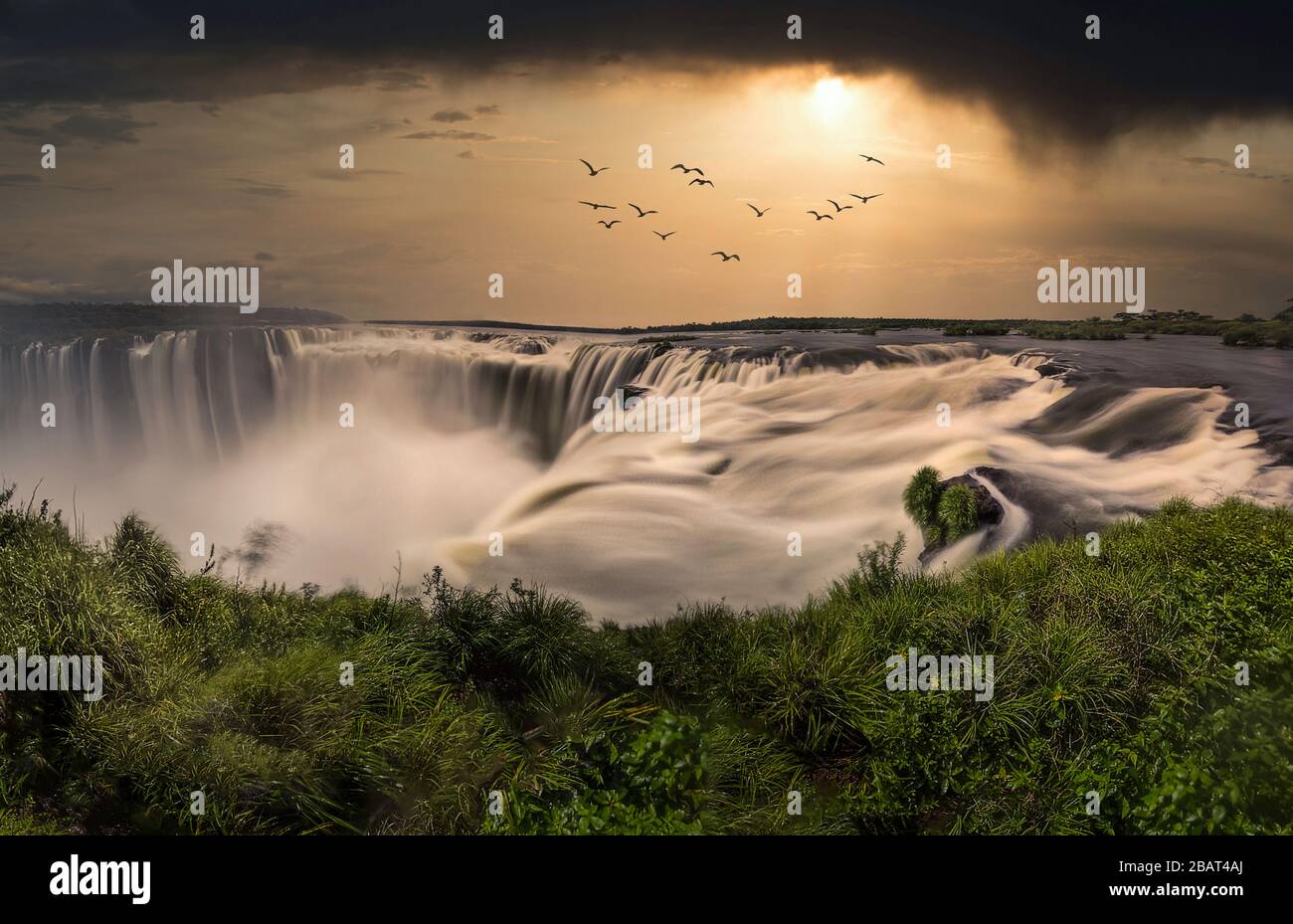 Dreamlike view of Iguazu Falls at sunset Stock Photo