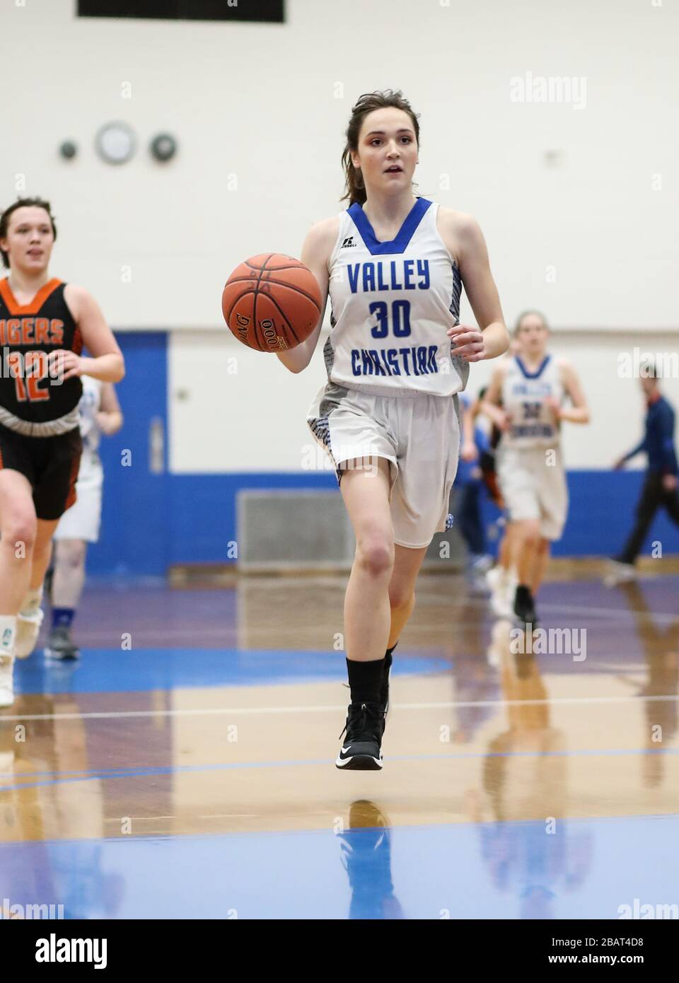 Basketball action with Odessa vs Valley Christian High School in
