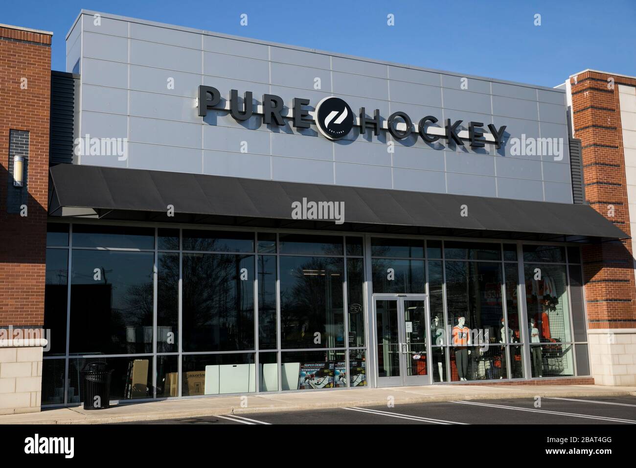 A logo sign outside of a Pure Hockey retail store location in North Wales, Pennsylvania, on March 23, 2020. Stock Photo